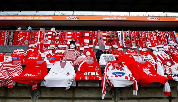 Jerseys and scarves are seen in the stands before the Bundesliga match between FC Cologne vs Fortuna Dusseldorf on Sunday. (AFP)