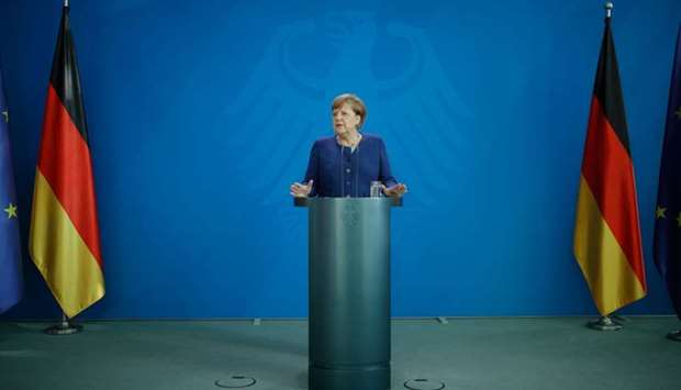 German Chancellor Angela Merkel addressing a press conference following a metting with international economic and Financial organisations at the Chancellery in Berlin, Germany, on the effects of the novel coronavirus pandemic on May 20.