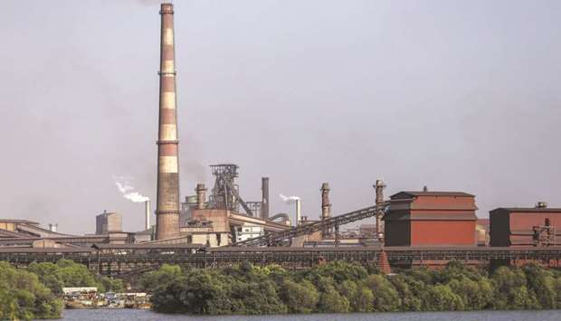 Smoke and steam rise from the JSW Steel manufacturing facility in Dolvi, Maharashtra. The Indian firm wonu2019t pursue overseas acquisitions until it turns around its businesses in the US and Italy, although it will continue to look at domestic opportunities, according to JSW Steelu2019s joint managing director Seshagiri Rao.