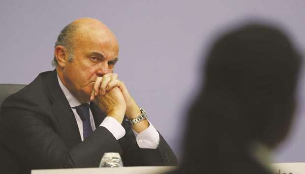 ECB vice president Luis de Guindos listens during a news conference in Frankfurt.