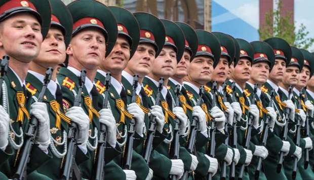 A May 9, 2019 file photo of soldiers marching through Red Square during the Victory Day military parade in Moscow.