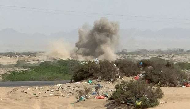 Smoke billows amid clashes between fighters loyal to Yemen's separatist Southern Transitional Council (STC) and government forces for control of Zinjibar, the capital of the southern Abyan province, in the Sheikh Salim area, on May 23.