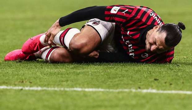 Zlatan Ibrahimovic after being tackled during the Coppa Italia semi-final against Juventus in February. Milan say he reported an injury to his soleus muscle in training. (AFP/Getty Images)