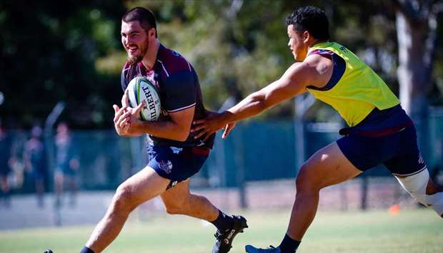 Queensland Reds captain Liam Wright (left) training in Brisbane yesterday. (AFP)