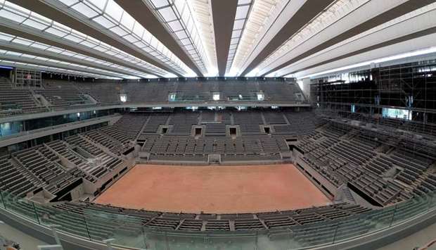 General view of the renovated Philippe-Chatrier central tennis court with its new retractable roof composed of 11 wings at Roland-Garros in Paris, France, yesterday. (Reuters)