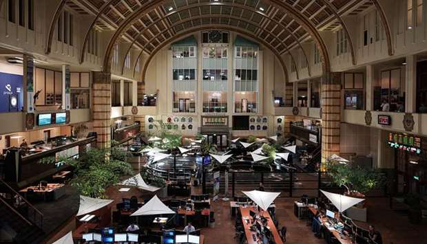 Financial traders monitor data on computer screens on the trading floor inside the Amsterdam Stock Exchange. For two years in a row, Europeu2019s largest stock-market listings have taken place in Amsterdam, which has beguiled companies with a deep pool of international investors and corporate governance norms that tilt in favour of management teams.