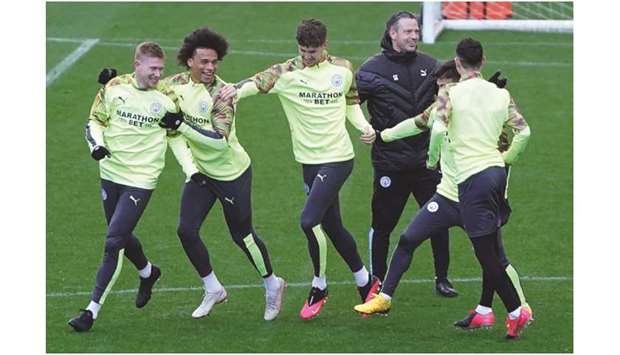 In this February 25, 2020, picture, Manchester City players take part in a training session at City Football Academy in Manchester, United Kingdom. (AFP)