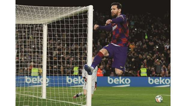 In this March 7, 2020, picture, Barcelonau2019s Lionel Messi celebrates after scoring a goal during the La Liga match against Santander at Camp Nou in Barcelona, Spain. (Reuters)