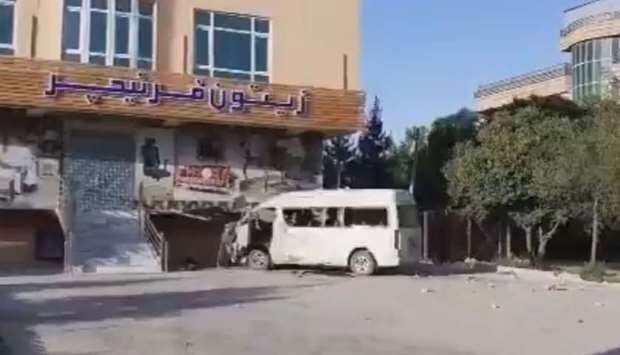 An image grab from a video posted online that shows the Khurshid TV vehicle damaged in the explosion