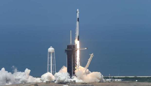 A SpaceX Falcon 9 rocket and Crew Dragon spacecraft carrying NASA astronauts Douglas Hurley and Robert Behnken lifts off during NASA's SpaceX Demo-2 mission to the International Space Station from NASA's Kennedy Space Center in Cape Canaveral, Florida