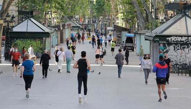 People exercise along Las Ramblas in Barcelona