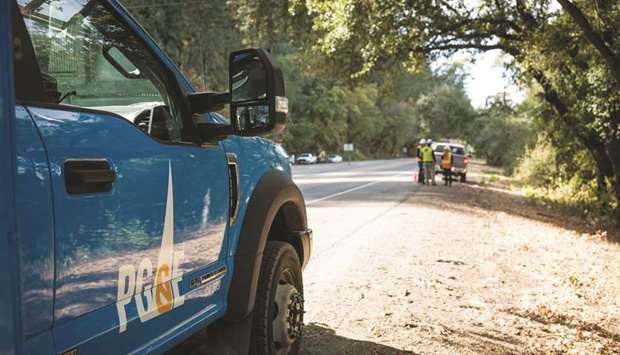 A PG&E Corporation logo is seen on a car in Calistoga, California. PG&E filed for Chapter 11 last year after its equipment was blamed for causing some of the worst blazes in state history including the Camp fire, which destroyed the town of Paradise and killed 85 people.