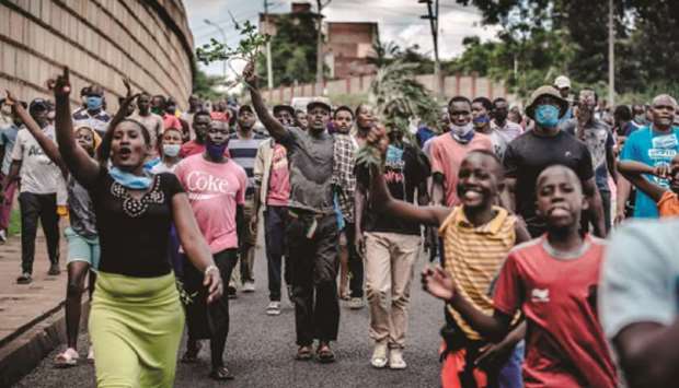People protest the death of a man in the Mathare slums of Nairobi yesterday. A 39-year-old was allegedly beaten to death by police officers the previous night while walking in the streets after curfew hours.