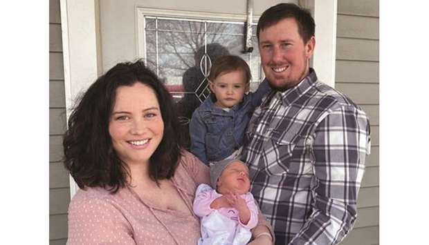 ALLu2019S WELL THAT ENDS WELL: Mallory, left, baby Alivia, daughter Emma Jean and husband Mitchell.