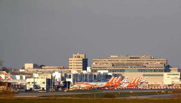 Easyjet and British Airways planes are pictured at Gatwick airport as the spread of the coronavirus disease continues, Gatwick Airport, Britain on March 23