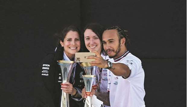 Mercedesu2019 British driver Lewis Hamilton poses for a selfie with team members after the Spanish Formula One Grand Prix race at the Circuit de Catalunya in Montmelo on the  outskirts of Barcelona.