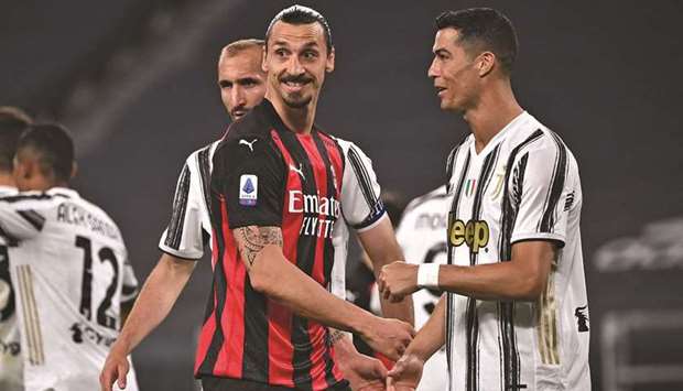 AC Milanu2019s Zlatan Ibrahimovic (centre) and Juventus Cristiano Ronaldo react during the Italian Serie A match on Sunday. (AFP)