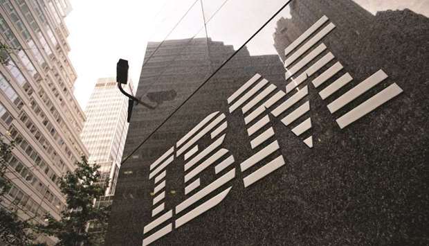 A logo hangs outside the International Business Machines Corp offices in New York. IBM is rolling out a new product that will help businesses automate tasks, capitalising on the rise of chat bots and virtual assistants during the pandemic and taking another step in its pivot towards cloud services and artificial intelligence.