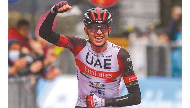 Team UAE Emirates rider US Joe Dombrowski celebrates as he crosses the finish line to win the fourth stage of the Giro du2019Italia yesterday. (AFP)