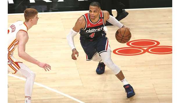 Washington Wizards guard Russell Westbrook is defended by Atlanta Hawks guard Kevin Huerter in the fourth quarter of their NBA game at State Farm Arena in Atlanta, Georgia. (USA TODAY Sports)