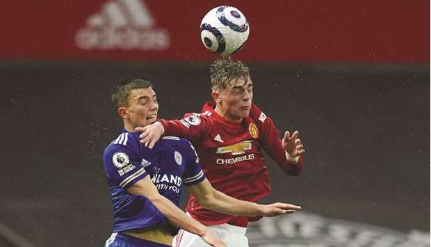 Leicester Cityu2019s Luke Thomas (left) vies for the ball with Manchester Unitedu2019s Brandon Williams in the Premier League. (Reuters)