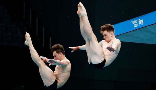 Britain's Tom Daley and Matthew Lee in action during the men's synchronised 10m platform final during FINA Diving World Cup 2021 and Tokyo 2020 Olympics Aquatics Test Event at Tokyo Aquatics Centre, Tokyo. REUTERS
