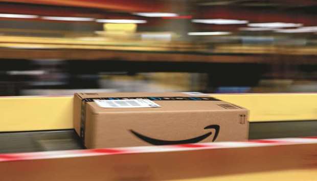 An Amazon Prime parcel passes along a conveyor at an Amazon.com fulfilment centre in Frankenthal, Germany. Amazon won its bid to topple $303mn tax bill in another blow to European Union competition chief Margrethe Vestageru2019s crackdown on preferential fiscal deals.