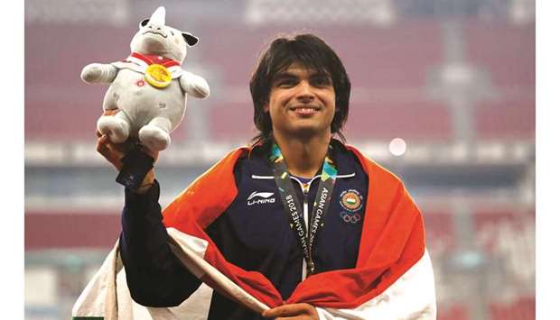 Gold medallist Neeraj Chopra of India poses on the javelin throw podium of the 2018 Asian Games in Jakarta on August 27, 2018. (Reuters)