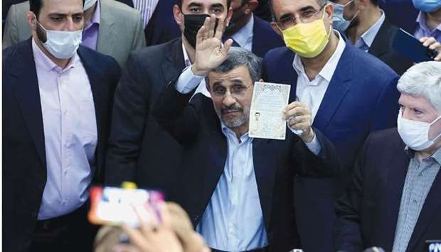 Iran former president Mahmoud Ahmadinejad registers his candidacy for the post of president, at the Interior Ministry in Tehran, on Wednesday.