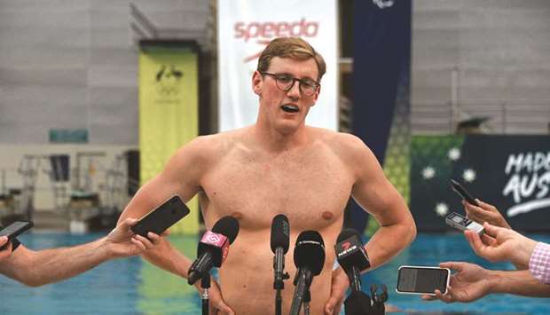 Australian swimmer Mack Horton speaks to the media at a uniform launch at the Sydney Olympic Park Aquatic Centre in Sydney yesterday.