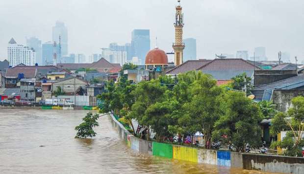 File photograph shows a general view of flooded residential houses after a heavy rain in Jakarta.