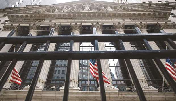 The front facade of the New York Stock Exchange. Earnings reports from major retailers will be in focus next week after the US stock market suffered one of its biggest pullbacks in months, with investors looking for clues on the pace of inflation and consumer spending and whether companies can sustain their strong earnings momentum.