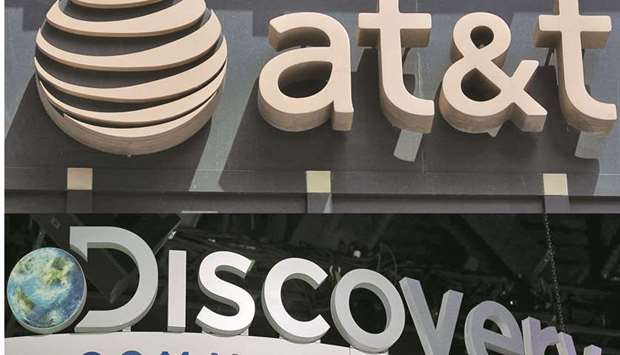 The AT&T logo is displayed outside a store in Washington, DC. AT&T is in talks to combine its media business with Discovery in a deal that would create a new entertainment powerhouse, according to people with knowledge of the matter, a surprising move for a company that spent $85bn to acquire the assets less than three years ago.