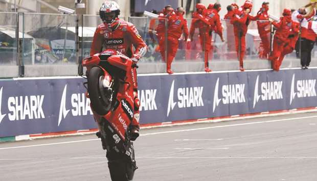 Ducati Lenovo Teamu2019s Jack Miller (also inset) crosses the line to win the French MotoGP at Le Mans yesterday.