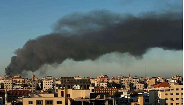 Smoke rises amid a flare-up of Israeli-Palestinian violence, in Gaza yesterday.