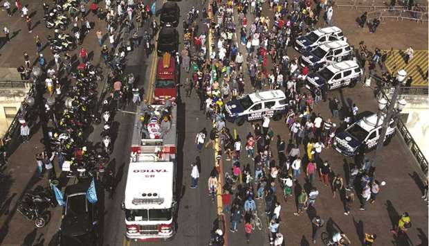 Aerial view of the coffin of Sao Paulou2019s Mayor Bruno Covas on a firefighter truck during a convoy as part of his funeral in Sao Paulo, yesterday.