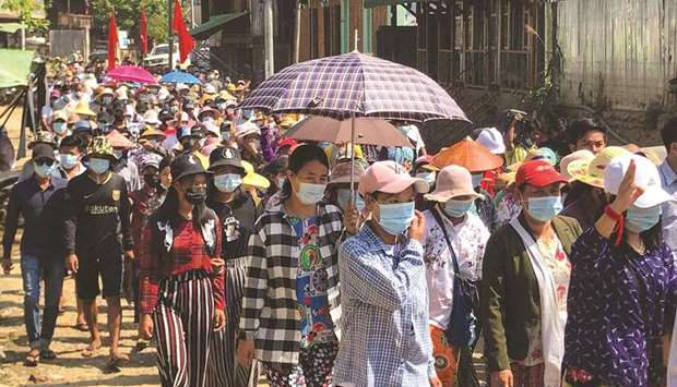 Protesters taking part in a demonstration in Hpakant in support of Mindat, a town in Chin state where a civilian defence force has clashed with the military, as the country remains in turmoil after the February coup.