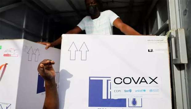Boxes of Oxford/AstraZeneca Covid-19 vaccines, redeployed from the Democratic Republic of Congo, arrive at a cold storage facility in Accra, Ghana, recently.(Reuters)