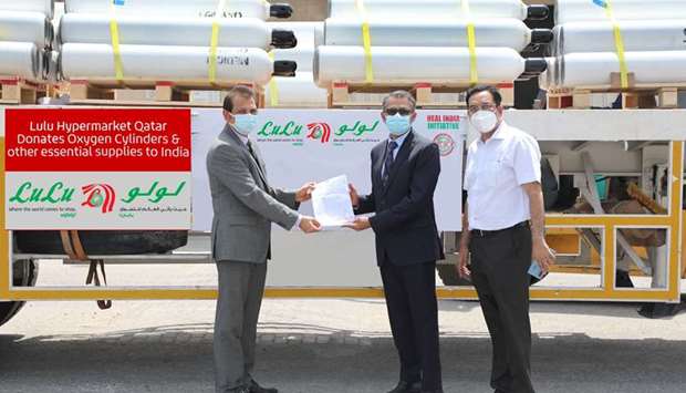 Caption: A LuLu Hypermarket Group official hands over the relief materials to the ICBF.