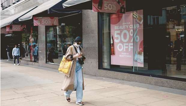 A pedestrian passes House of Fraser UK & Ireland department store on Oxford Street in central London. Britainu2019s inflation rate doubled in April, marking the beginning of a surge in prices that will fuel speculation about when the Bank of England could start taking its foot off the stimulus pedal.