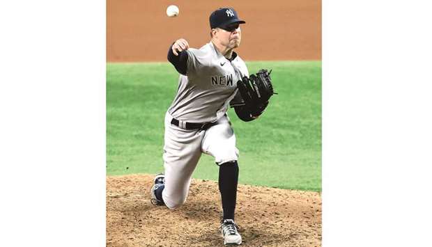 New York Yankees starting pitcher Corey Kluber throws during their MLB game against the Texas Rangers at Globe Life Field in Arlington, Texas, USA. (USA TODAY Sports)