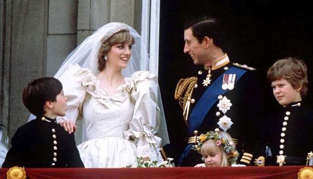 (File photo) Prince Charles and Princess Diana stand on the balcony of Buckingham Palace in London, following their wedding at St. Pauls Cathedral on June 29, 1981. (REUTERS)