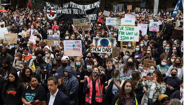 Students participate in a ,School Strike 4 Climate, rally, demanding action on climate change, in Sydney, Australia
