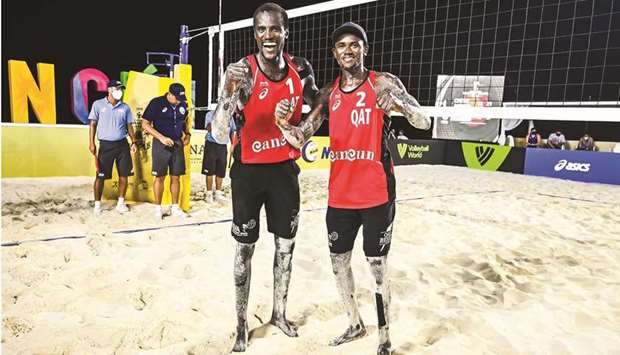 Qataru2019s Cherif Younousse and Ahmed Tijan celebrate their win in the semi-final of the third tournament at the FIVB Beach Volleyball World Tour Cancun Hub on Saturday. (FIVB)