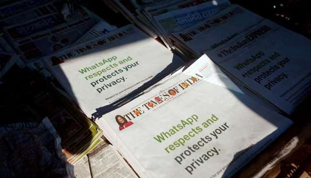 A WhatsApp advertisement is seen on the front pages of newspapers at a stall in Mumbai, India, January 13. REUTERS