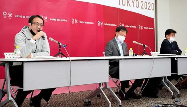 Tokyo University Faculty of Economics associate professor Taisuke Nakata (L) speaks during a press conference with Center for Emergency Preparedness and Response (CEPR) director Tomoya Saito (C) and Tokyo 2020 Games Delivery Officer Hidemasa Nakamura (R) after a roundtable on Covid-19 countermeasures at the Tokyo 2020 Games, in Tokyo, Japan
