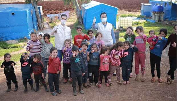 Qatar Charity starts Zakat Al-Fitr distribution to Syrian refugees in Turkeyrnrn