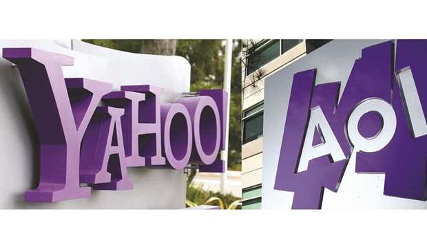 Combination of pictures shows the Yahoo logo is displayed in front of its headquarters in Sunnyvale and the AOL logo posted on a sign in front of its offices in Palo Alto. Verizon announced yesterday it was selling faded Internet stars Yahoo and AOL to a private equity firm for $5bn, ending the media ambitions of the telecoms giant.