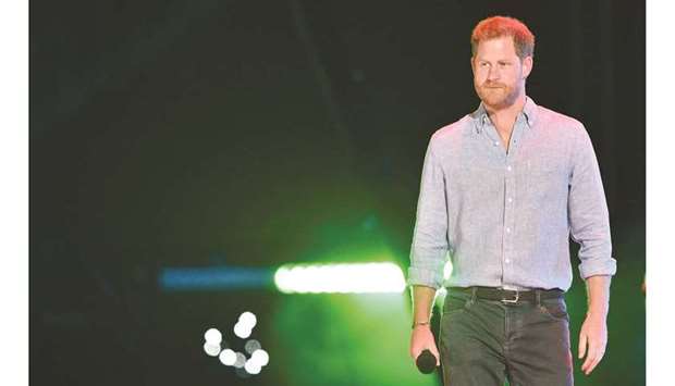 Britainu2019s Prince Harry, Duke of Sussex, arrives onstage to speak during the taping of the u2018Vax Liveu2019 fundraising concert.