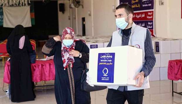 The distribution of Zakat Al-Fitr aims to share the joy of Eid with the beneficiaries and alleviate their suffering in light of the continuing coronavirus pandemic.      